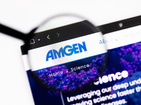 Milan, Italy 2026, 20 Apr Closeup of Amgen website on a laptop screen. Amgen logo under a magnifying glass.