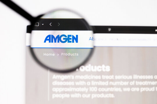 Milan, Italy 2026, 20 Apr Closeup of Amgen website on a laptop screen. Amgen logo under a magnifying glass.
