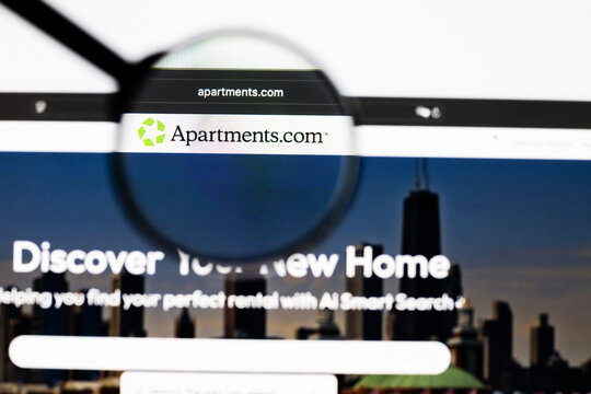 Milan, Italy 2026, 20 Apr Closeup of apartments.com website on a laptop screen. apartments.com logo under a magnifying glass.