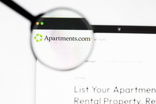 Milan, Italy 2026, 20 Apr Closeup of apartments.com website on a laptop screen. apartments.com logo under a magnifying glass.