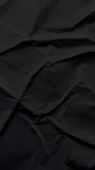 Fototapeta premium Dark black crumpled paper texture background mobile wallpaper