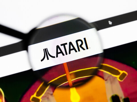 Milan, Italy 2026, 20 Apr Closeup of Atari website on a laptop screen. Atari logo under a magnifying glass.