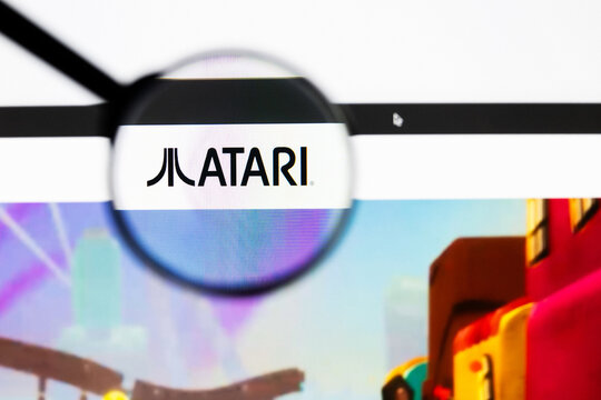 Milan, Italy 2026, 20 Apr Closeup of Atari website on a laptop screen. Atari logo under a magnifying glass.
