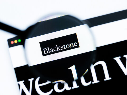 Milan, Italy 2026, 20 Apr Closeup of Blackstone website on a laptop screen. Blackstone logo under a magnifying glass.