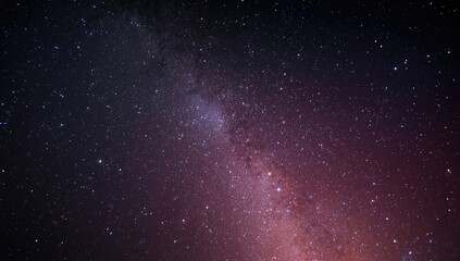Fototapeta premium Hypnotic night sky filled with twinkling stars and spectacular nebula colors