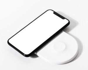 Smartphone png screen charging on a wireless charger © Rawpixel.com