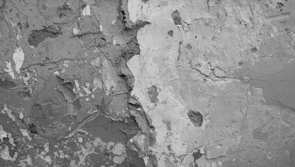 Fototapeta premium Monochrome detailed photo of a grey concrete wall showing surface texture and paint decay