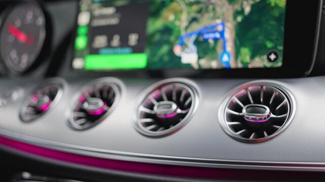 03 October 2025 Germany Munich. Sophisticated Vehicle Interior Boasting Ambient Illumination And Navigation Tools. Exclusive Automotive Interior Emphasizing Modern Lighting Options