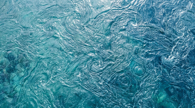 Swirling blue water currents in a deep ocean surface
