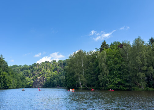 canoe on lake over the Kriebstein Nature Reserve at the Kriebstein Dam in Saxony, Germany.	