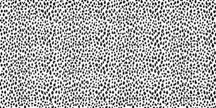 Black and white spotted pattern with irregular organic shapes