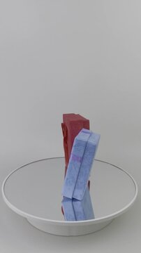4K Vertical Luxury Product Showcase Gift Boxes Rotating Clockwise