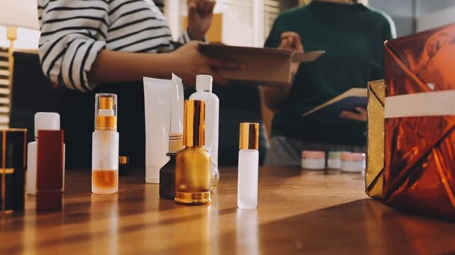 Diverse Beauty Bloggers Live Streaming Makeup Product Review on Social Media, Young Women Recording Video for Vlogging Channel with Ring Light, Friends Selling Cosmetic Products Online from Home