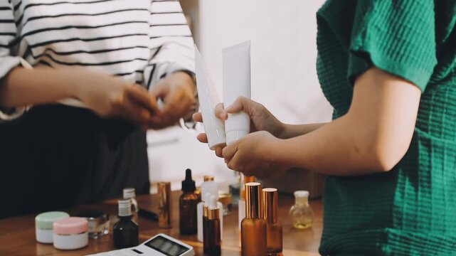Diverse Beauty Bloggers Live Streaming Makeup Product Review on Social Media, Young Women Recording Video for Vlogging Channel with Ring Light, Friends Selling Cosmetic Products Online from Home