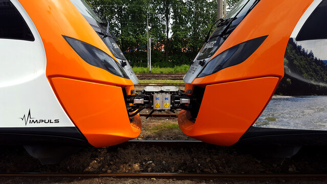 Bielsko-Biala, Poland - August 25, 2016: Two Polish PKP Koleje Malopolskie regional train Newag EN63 Impuls.
