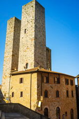 Naklejka premium View of the famous reinassance towers of San Gimignano, medieval village of Tuscany (Province of Siena, Italy); is world famous for white wine production (named 