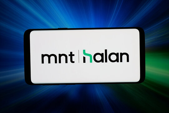 Stuttgart, Germany - 06-02-2026: In this photo illustration, the logo of Egyptian financial services company MNT-Halan is displayed on a smartphone in front of abstract background on computer screen.