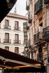 Fototapeta premium Street photography of Madrid, Spain. Alley and roads of Spanish architecture