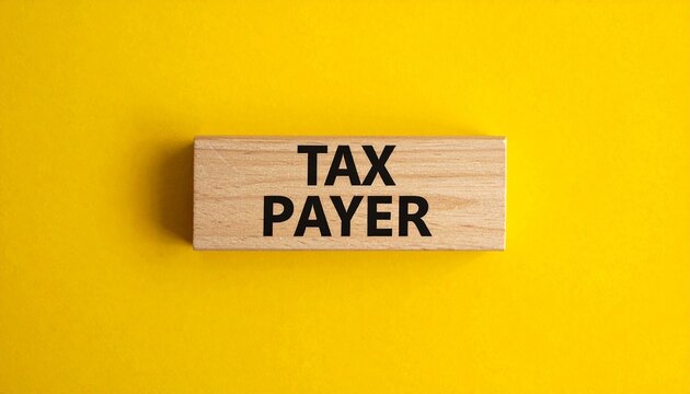 Wooden Block with the Word &ldquo;TAX PAYER&rdquo; on Bright Yellow Background