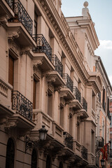 Obraz premium Architecture of the city center of Madrid, Spain. Alley and narrow roads with Spanish balconies and design.