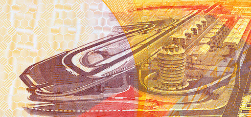 Fototapeta premium Bahraini half dinar banknote featuring the Bahrain International Formula One racetrack. Bahraini money.