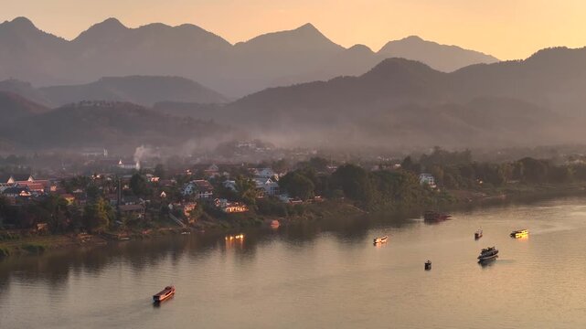 Aerial view of heritage city of Luang Prabang and Mekong river landscape at sunset Time in Laos, Asia. Lao Republic.
