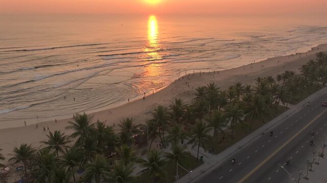 Da Nang coastal city at morning, cityscape with a long Beach, Crowded urban Coastline. Sea vacation, traveliving Vietnam