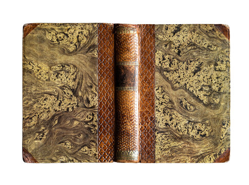 Antique hardcover book with an ornate decorative binding made of cloth and illustrated cardboard, featuring rich gold embossing and vivid colors. Isolated on a white background 