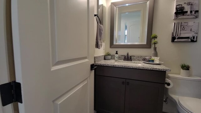 Bright modern apartment interior with bedroom and adjacent bathroom
