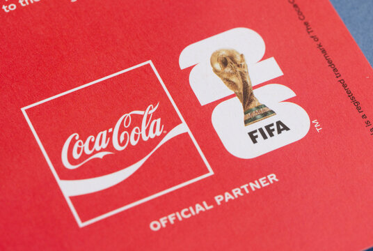 LONDON, UK - JUNE 2026: Coca Cola logo displayed as official FIFA World Cup partner on promotional material highlighting sponsorship of international football
