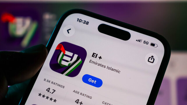 Closeup of a smartphone screen displaying the emirates islamic ei mobile banking app on the apple app store, showing the app icon and rating