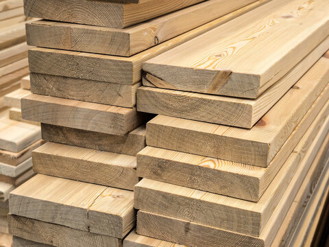 Stacked Pine Lumber Planks Close-up for Construction