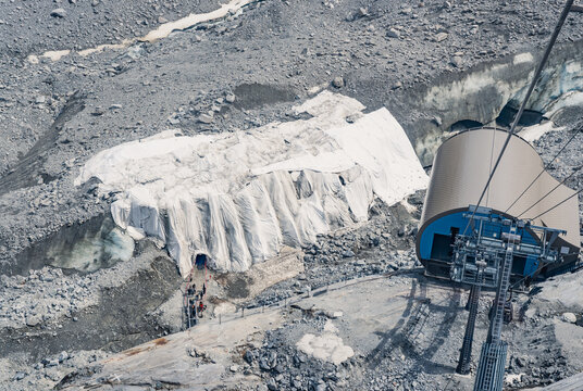 Gondola cable car above Mer de Glace glacier in Chamonix, French Alps