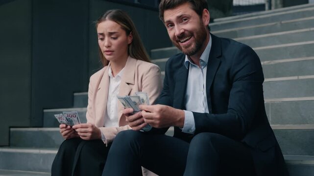 Two business rich man sad woman in city counting money financial unequal at work cash happy Caucasian male frustrated female businessman businesswoman gender inequality girl guy discrimination sexism