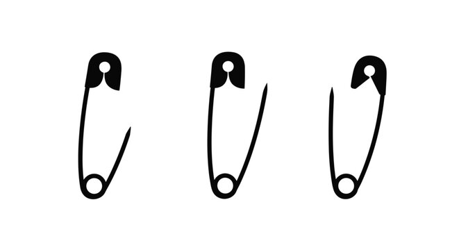 Three black safety pins in open position arranged horizontally on white background represent sewing and craft tools.