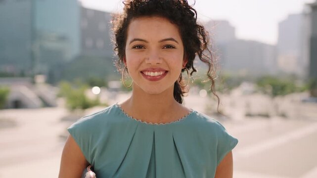 Face, laugh and business woman in city, real estate agent or professional with career growth. Portrait, happy person or funny realtor in town with confidence, about us or worker with wind in Portugal