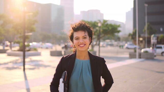 Face, corporate and happy businesswoman in city, financial accountant or funny worker with investment. Portrait, person or auditor laugh outdoor with wind, about us and bookkeeping professional