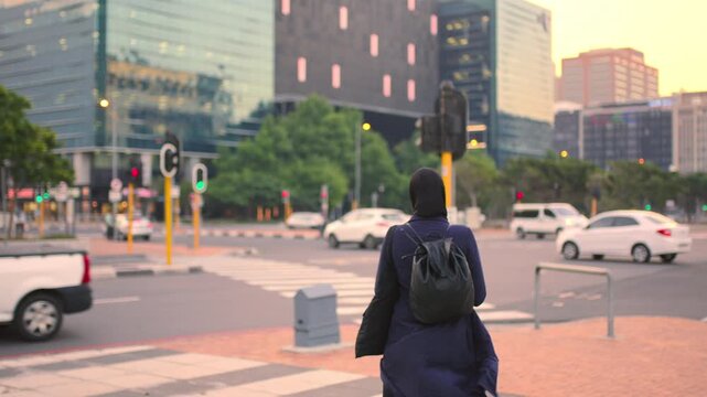 Backpack, commute and muslim woman in city for university, higher education or travel for studying. Academic, opportunity and islamic student in town for college, trip and scholarship for learning