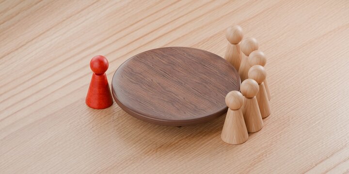 pawn figurines standing round a table, with one pawn highlighted in red. Corporate work environment, meeting, interview