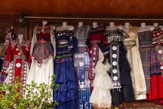 Traditional Hmong dresses in Sapa market display
