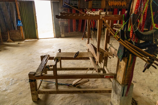 Rustic wooden loom in traditional Sapa village house