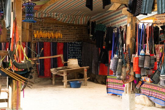 Colorful textiles in traditional Sapa market in Vietnam