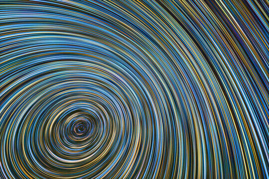 Star trails in a vibrant night sky over northern hemisphere