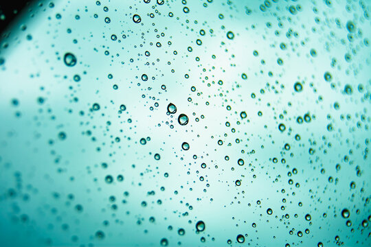 Water drops on glass as abstract art background
