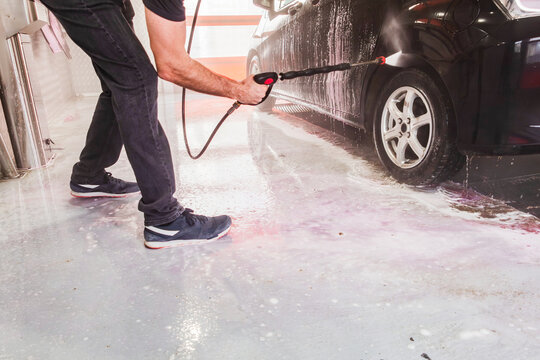 Self-service car wash with foam and high-pressure spray