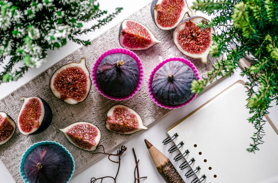 Fresh figs on rustic board with summer vibe