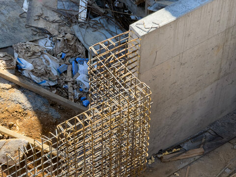 Steel rebar and concrete at an active construction site
