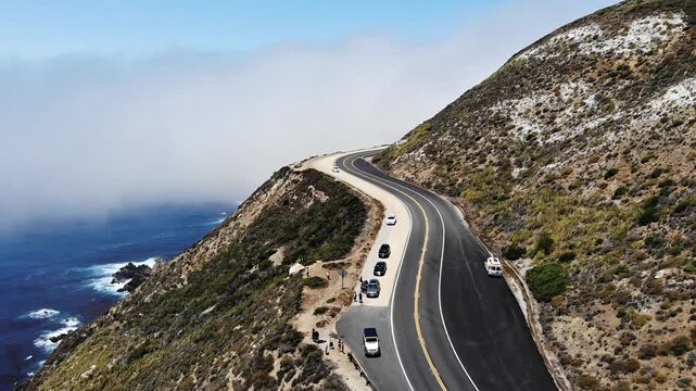 Aerial Drone, Highway 1 Along Coastal Cliffs in Fog, Big Sur California, 4K