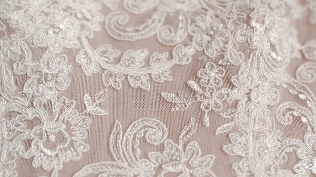 Delicate floral lace fabric with embroidered ornamental texture
