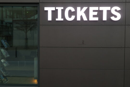 Tickets Sign on Modern Building Facade